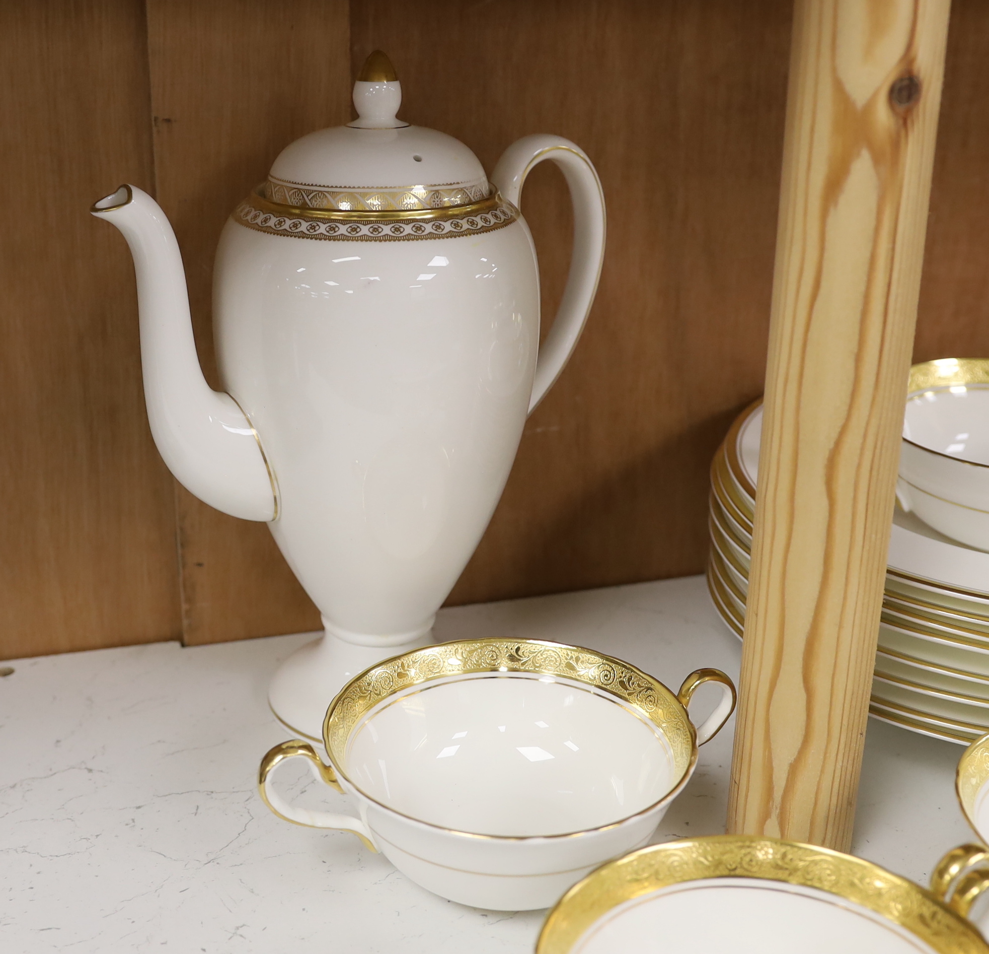 Anysley Argosy, Wedgwood Gold Florentine, Worcester gold decorated dinner wares including coffee pot, soup bowls, twin handled bowls and plates